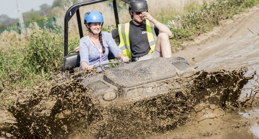 Hen making a splash in an Argocat off road vehicle