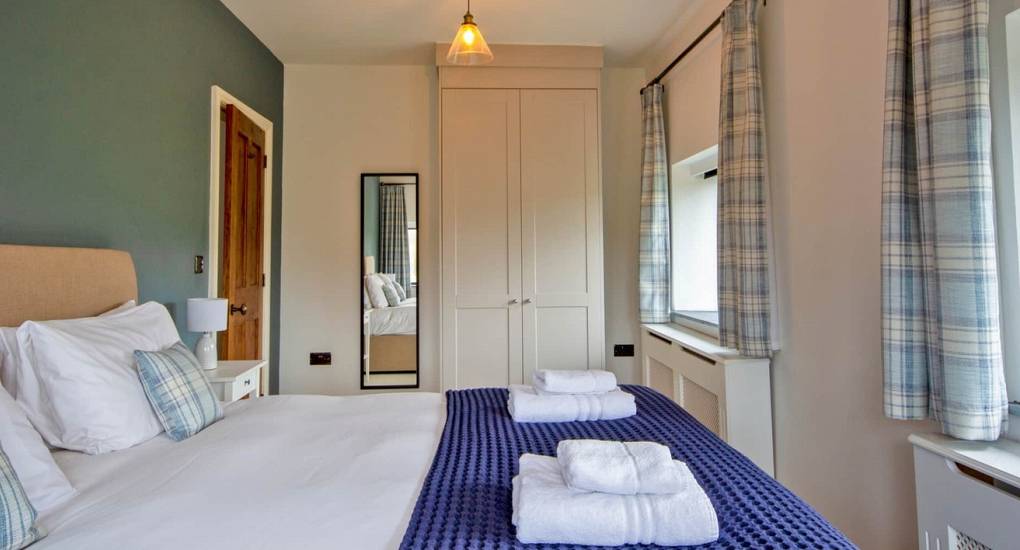Modern double bedroom at Godfrey Manor, a luxury hen party venue located in the heart of the Peak District.