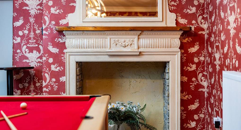 Grand Manor Luxury Party House fire place in games room