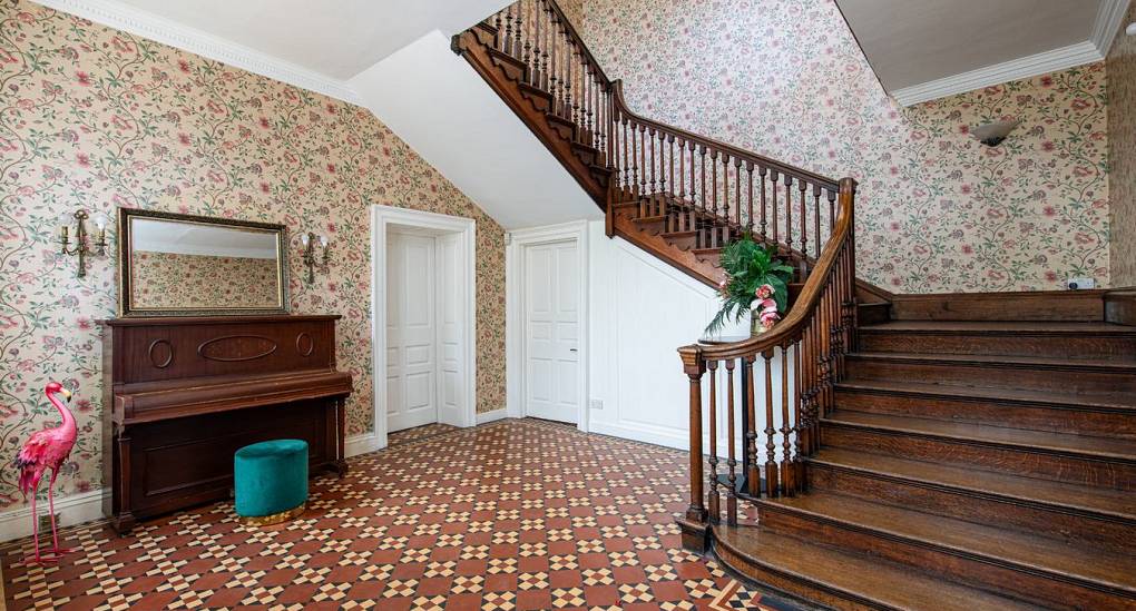 Grand Manor Luxury Party House hallway stairs