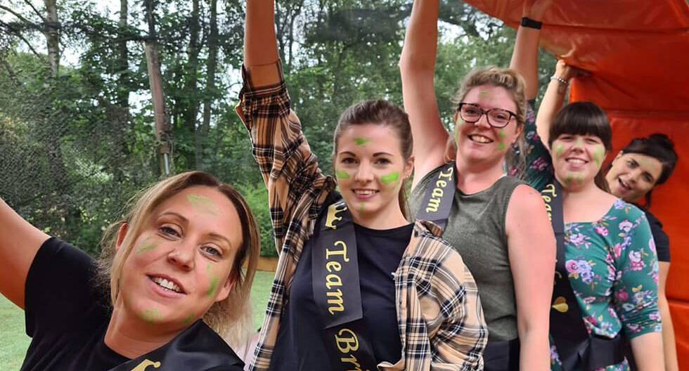Hen do posing for a quick pic before the Inflatable Games