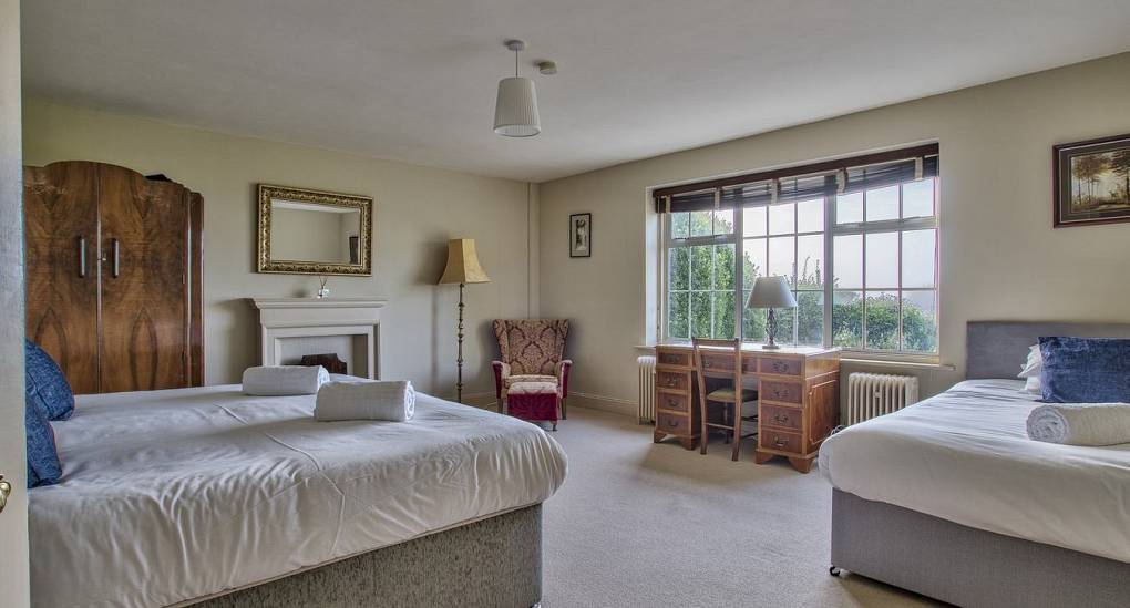 Big bedroom with two double beds