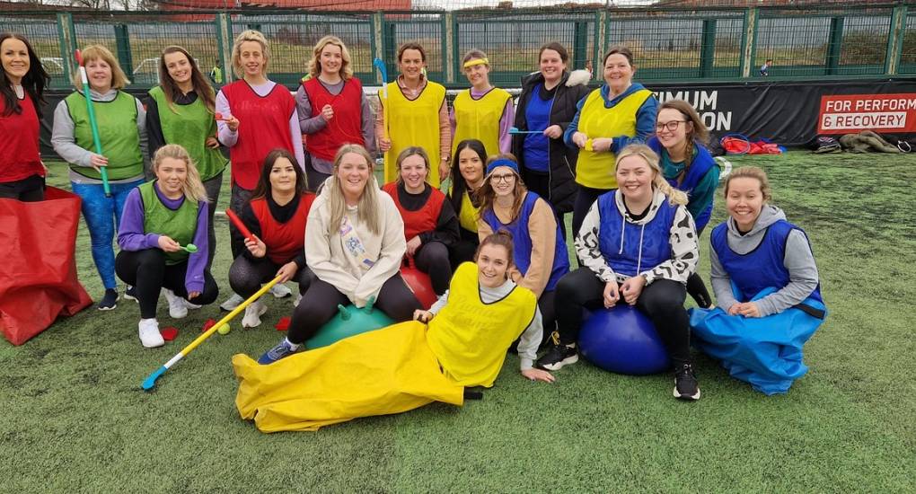 Hen group pose for pic old school sports day