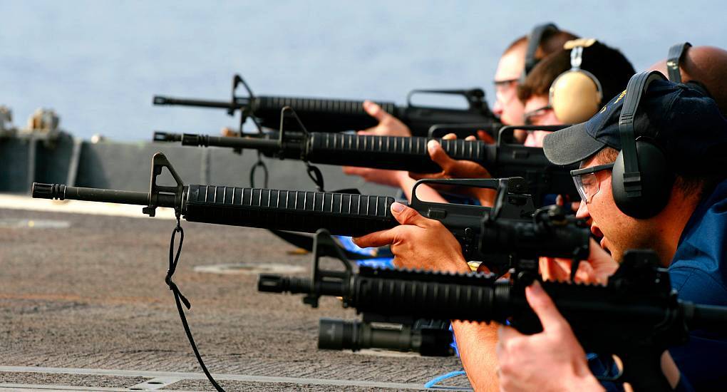 Group of stags taking aim